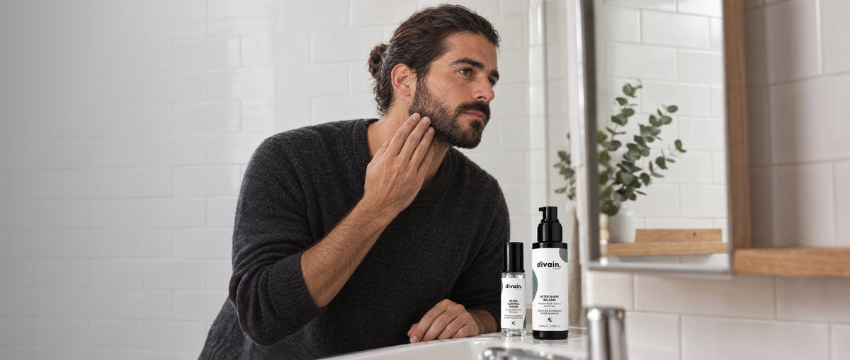Hombre cuidándose la barba con divain. Care