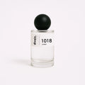 Bote de perfume equivalente unisex divain.1018