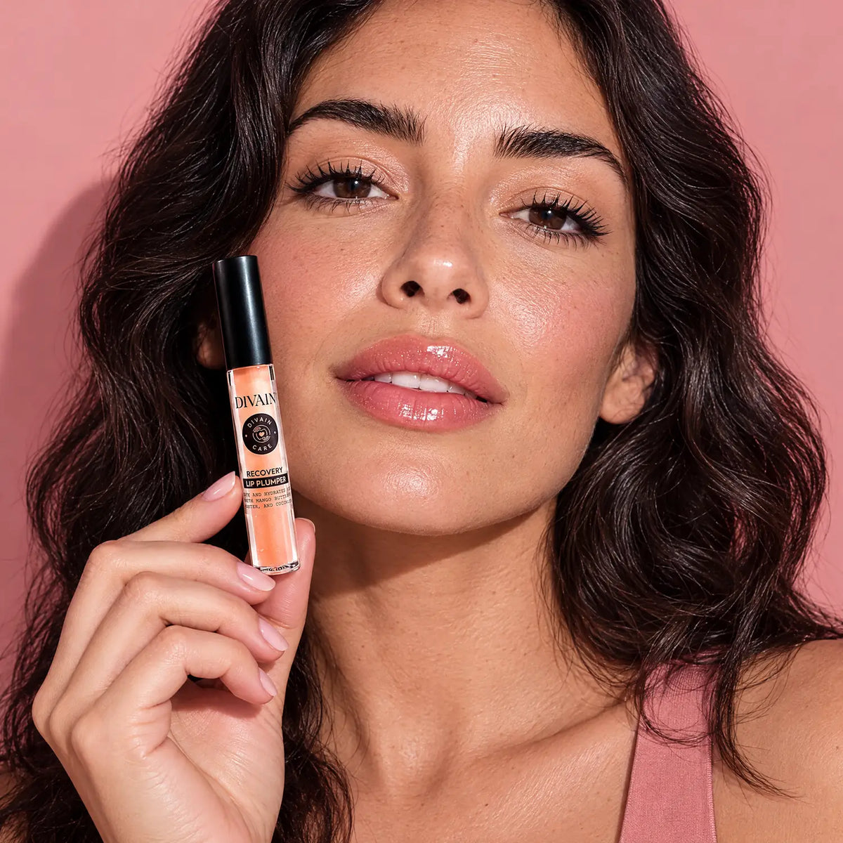 Persona usando divain. Care Recovery Lip Plumper