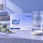 OXI-Z PLUS con un vaso de agua y la cápsula del día
