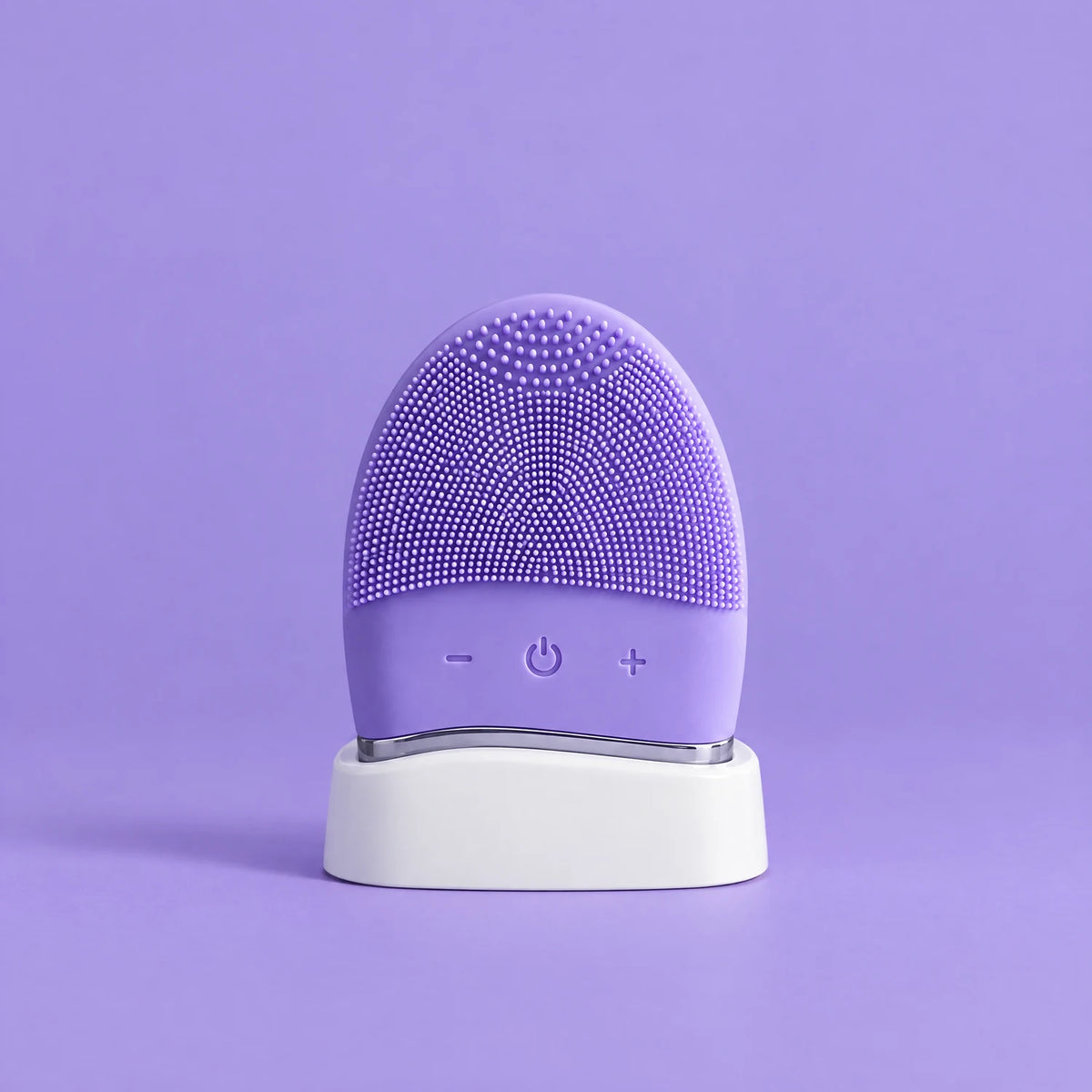 Masajeador limpiador facial divain. Care lila en su soporte