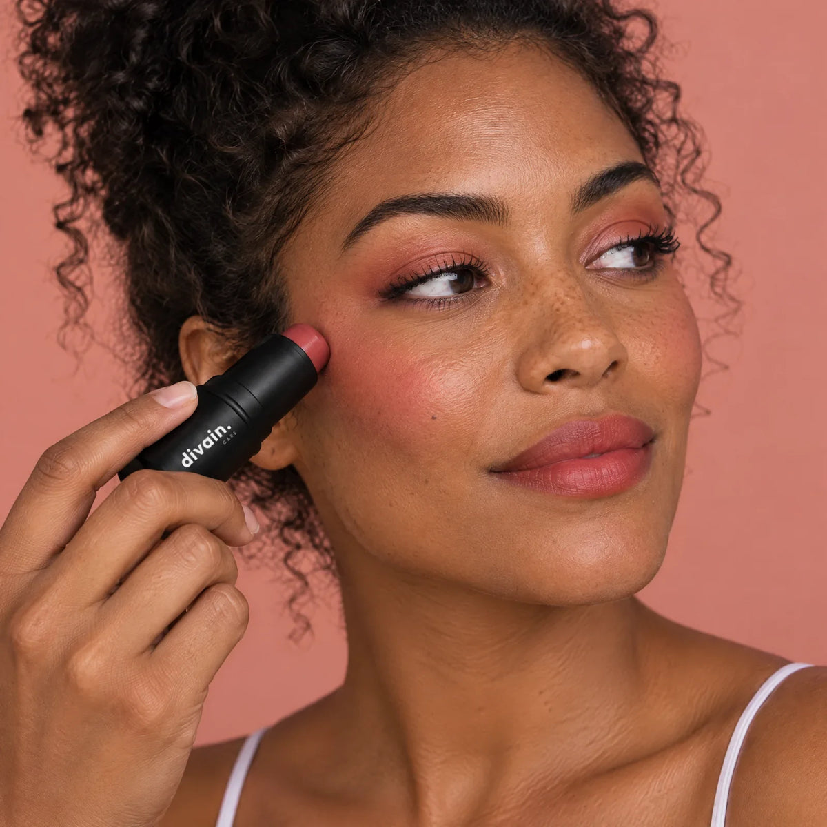 Multi Stick Spice applied to the face
