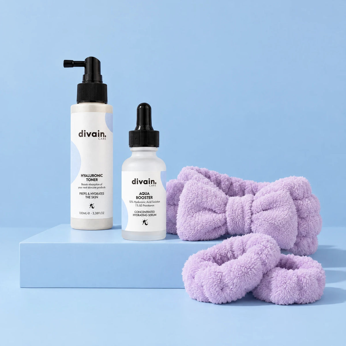 Pack divain. Care Piel seca: Hyaluronic Toner, Aqua Booster y set de diadema y muñequeras