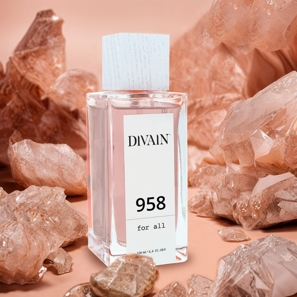 Perfume divain-958 surrounded by rose-coloured minerals