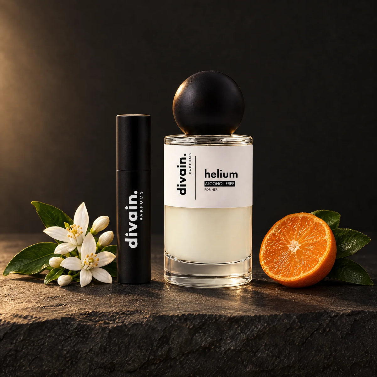Atomizador divain. junto a un perfume divain. para llevar tu fragancia contigo