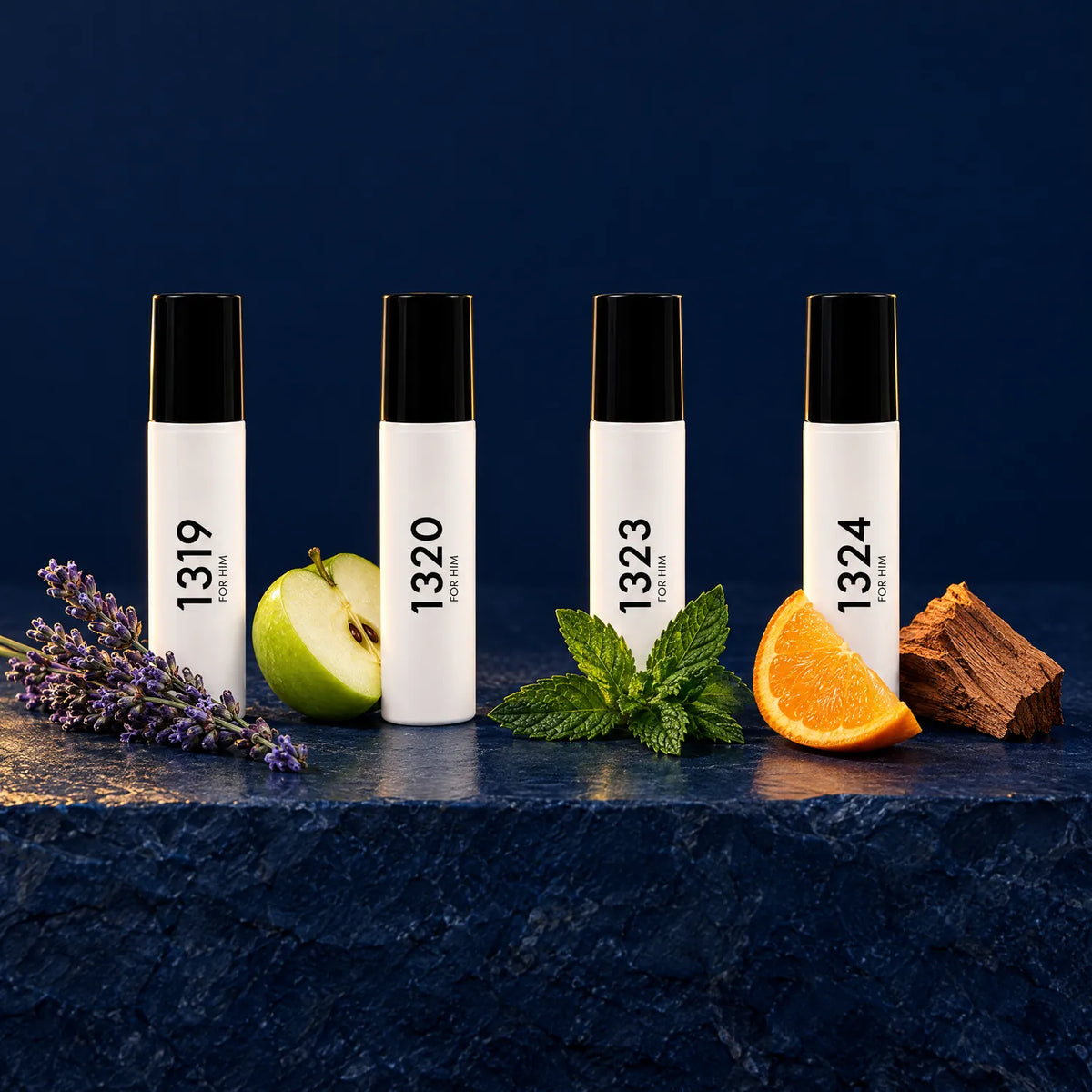 Las cuatro miniaturas con lavanda, manzana verde, menta, naranja y madera