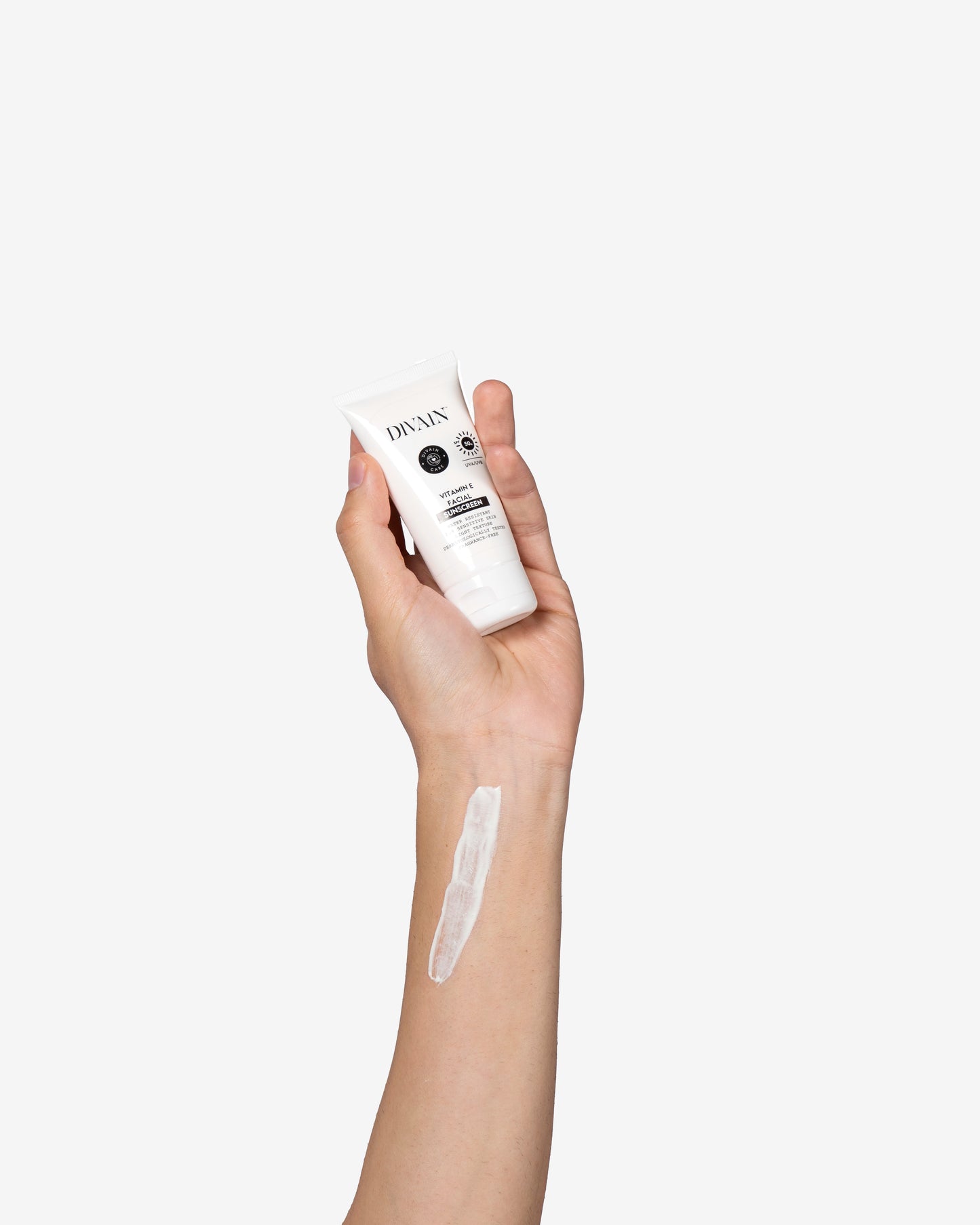 A hand showing the face cream