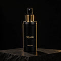 Ambientador en spray Mystic de divain. sobre piedra negra