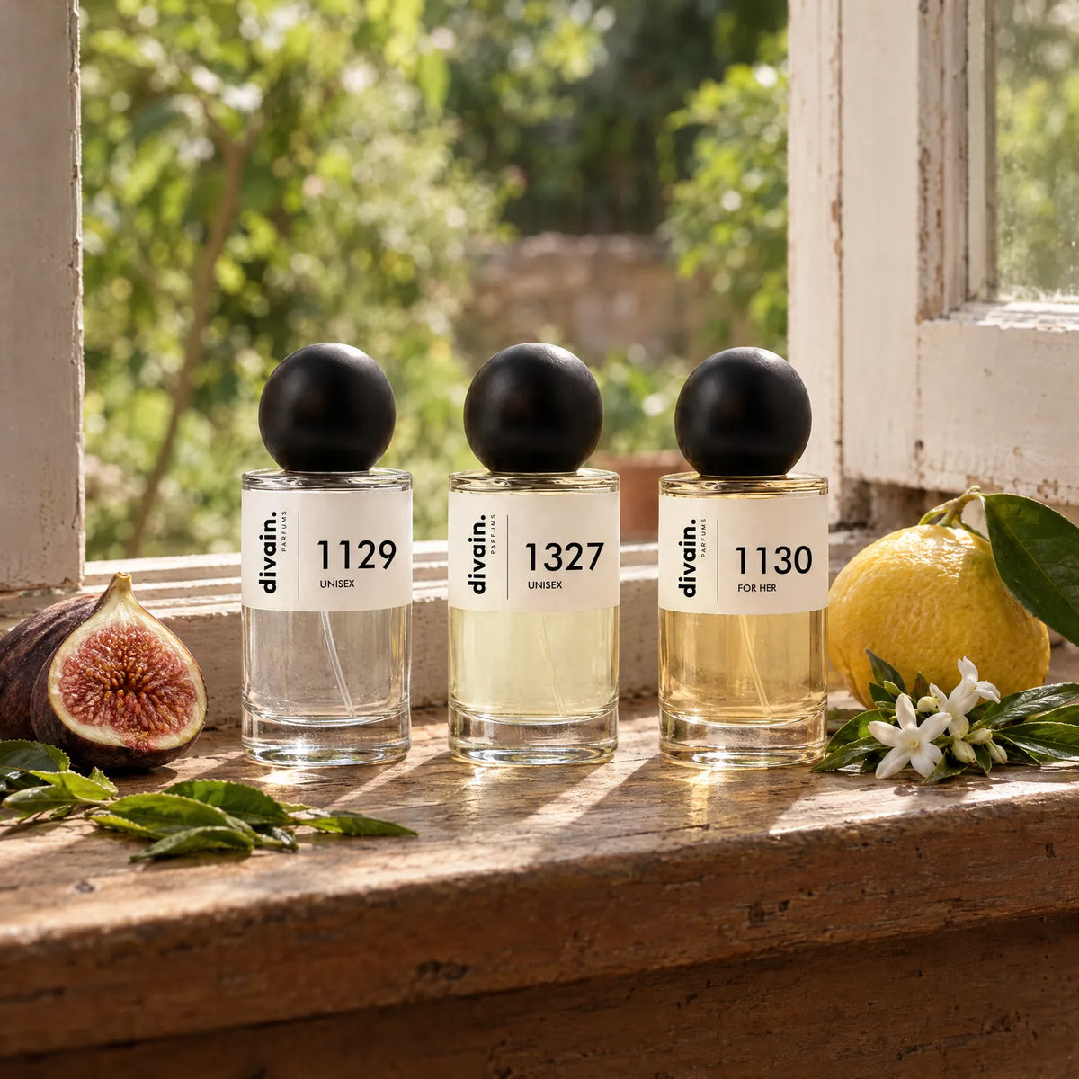 Perfumes divain. 1129, 1327 y 1130 en una ventana con higo, limón y jazmín