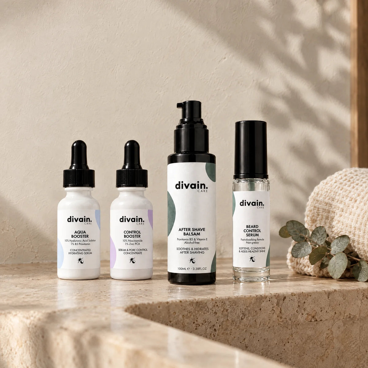 Productos divain. Care en un lavabo de travertino