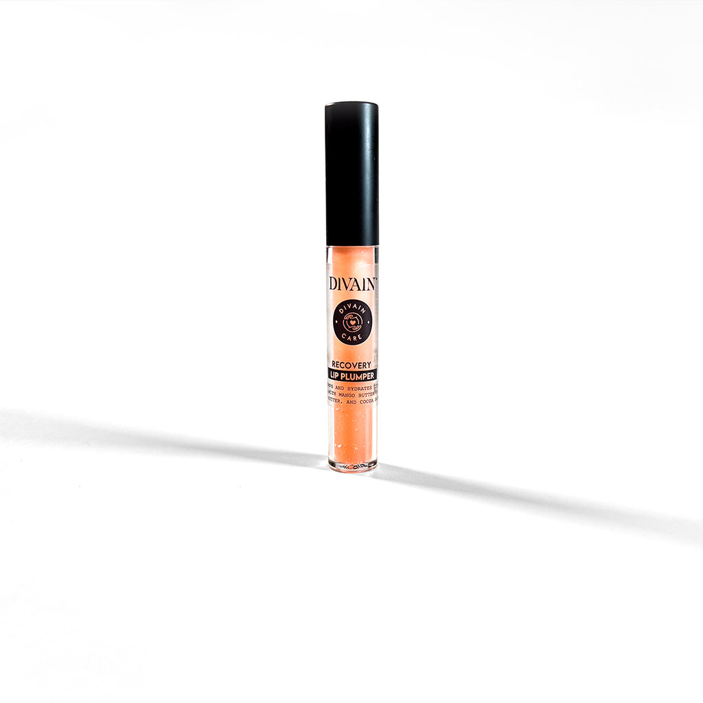 Voluminizador de labios Recovery Lip Plumper de Divain Care en envase transparente con aplicador negro