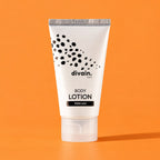 Body Lotion divain.602 Free sobre fondo mandarina