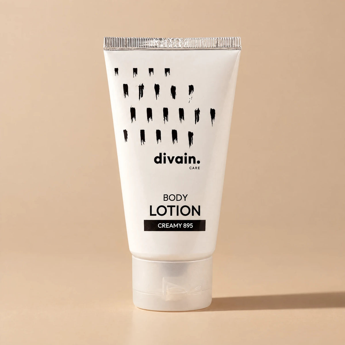 Body Lotion divain.895 Creamy sobre fondo caramelo latte