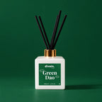 Ambientador mikado Green Dao de divain. sobre fondo verde