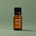 Aceite esencial de romero divain. RITUAL 10 ml sobre fondo verde salvia
