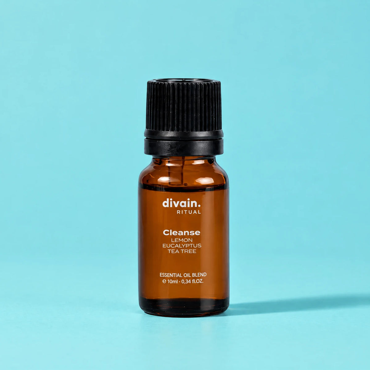 Mezcla de aceites esenciales Cleanse divain. RITUAL 10 ml sobre fondo aguamarina