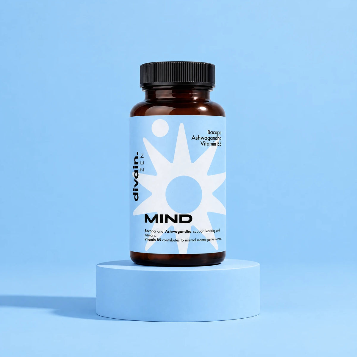 MIND divain. ZEN, complemento con bacopa, hierro y vitamina B5 sobre fondo azul cielo