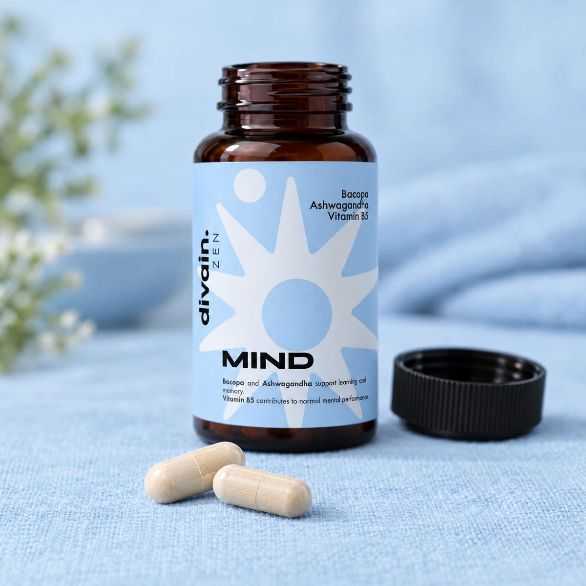 Cápsulas de MIND junto al bote abierto