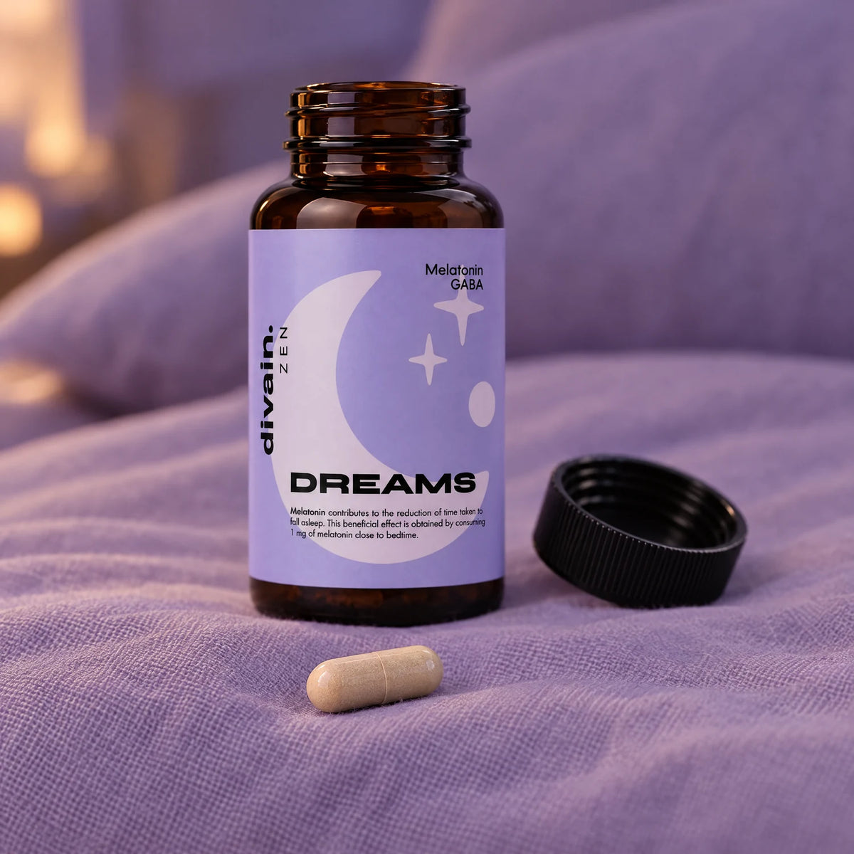 Cápsula de DREAMS junto al bote abierto sobre la almohada