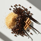 Café, tonka y vainilla representando las notas olfativas del perfume.