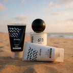 Perfume divain 611 unisex con su crema corporal y su gel en la playa.